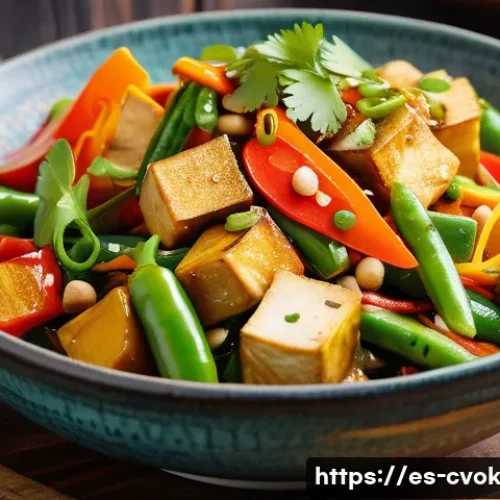 대체 단백질 요리법으로 만드는 퓨전 요리 - A vibrant Thai-style vegetable stir-fry featuring firm tofu marinated in soy sauce, fresh ginger sli...