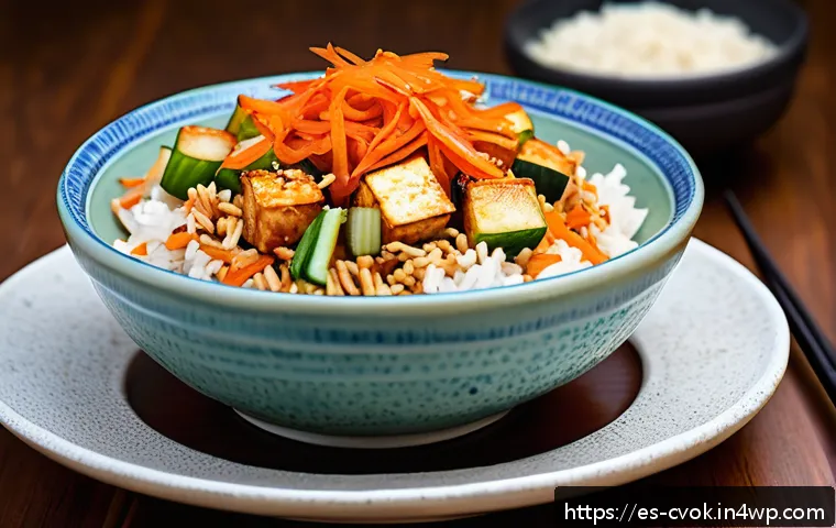 대체 단백질 요리법으로 만드는 김치 볶음밥 - A vibrant close-up shot of a colorful kimchi fried rice bowl featuring firm tofu cubes marinated in ...
