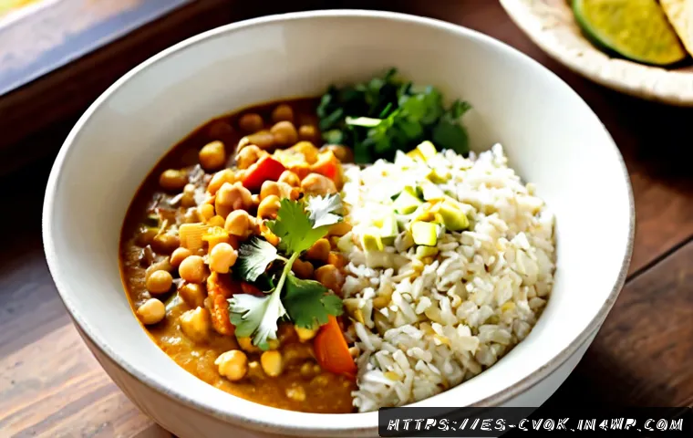 대체 단백질 요리법으로 만드는 베지터블 커리 - Photorealistic vegetable curry made with plant-based protein chunks, chickpeas, zucchini, bell peppe...